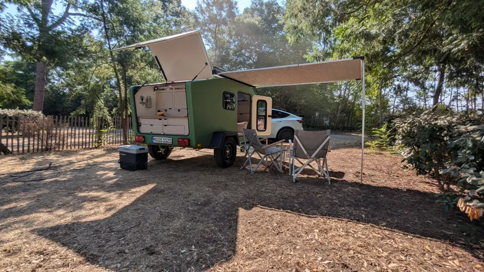 Glide with open rear kitchen, side door and awning