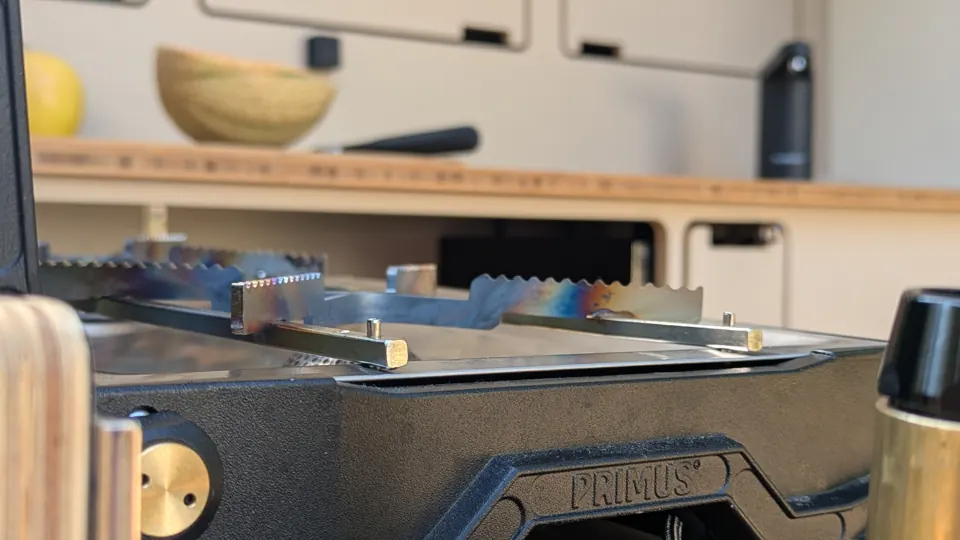 Close-up of the Primus Kinjia gas stove on the swing-out in front of the kitchen
