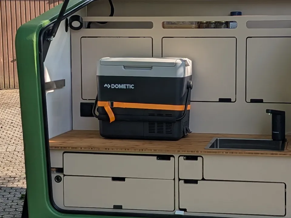 Dometic cooler on the bamboo worktop of the rear kitchen